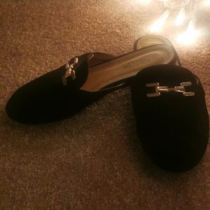 Cute black slip-ons with gold buckle